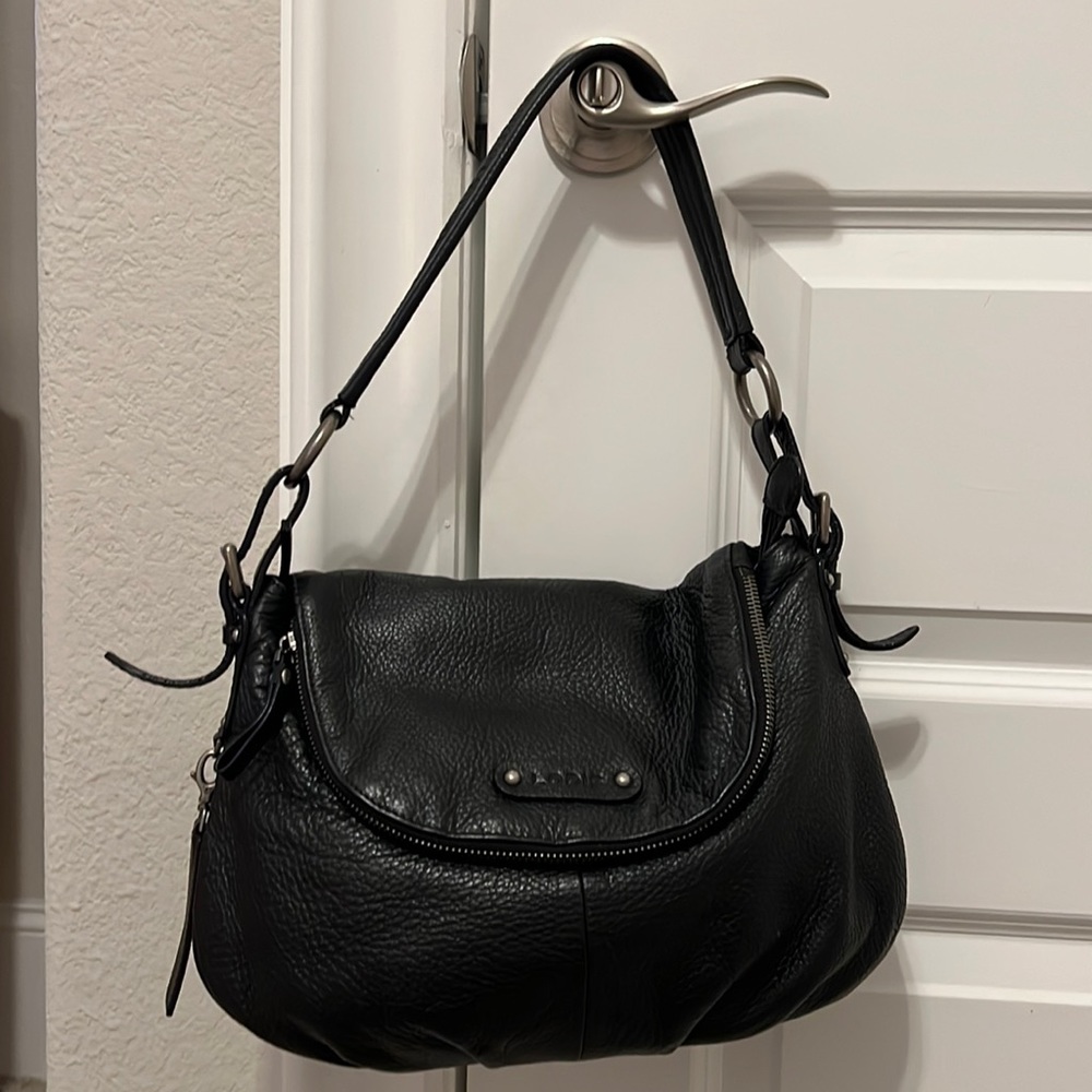 Lodis black purse.  Has many compartments.